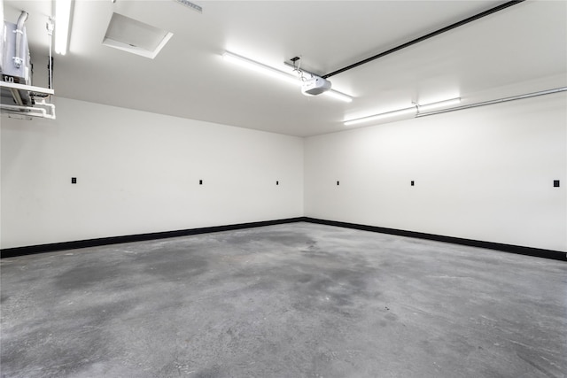 34544 Eagle Crest Dr, Polson, MT 59860 - garage with a garage door opener and baseboards