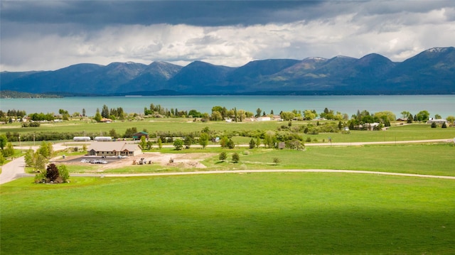 34544 Eagle Crest Dr, Polson, MT 59860 - drone / aerial view of a water and mountain view
