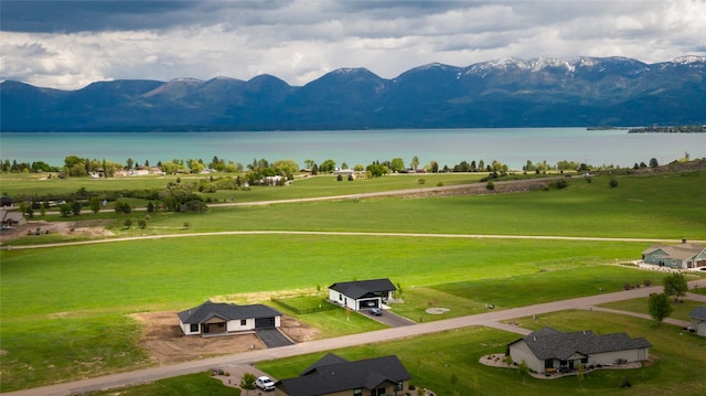 34544 Eagle Crest Dr, Polson, MT 59860 - drone / aerial view of a water and mountain view