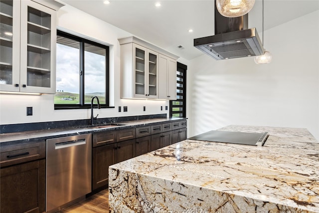 34544 Eagle Crest Dr, Polson, MT 59860 - kitchen featuring stainless steel dishwasher, wall chimney range hood, dark brown cabinetry, light wood finished floors, and stovetop with downdraft