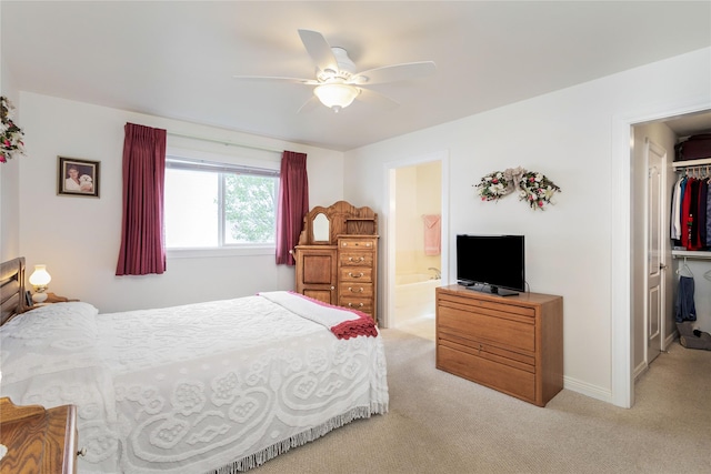 173 Empire Loop, Kalispell, MT 59901 - bedroom featuring carpet floors, ceiling fan, connected bathroom, and a closet