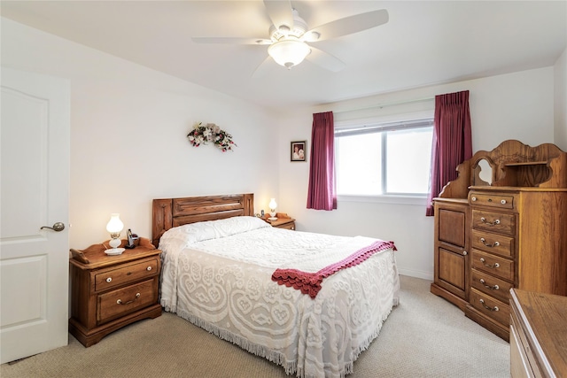 173 Empire Loop, Kalispell, MT 59901 - bedroom featuring light carpet, ceiling fan, and baseboards