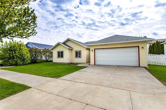 173 Empire Loop, Kalispell, MT 59901 - single story home with concrete driveway and an attached garage