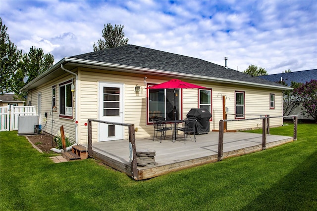 173 Empire Loop, Kalispell, MT 59901 - rear view of property featuring a wooden deck and a shingled roof