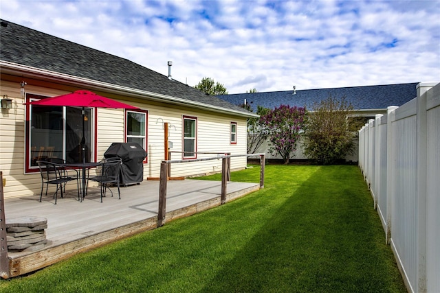 173 Empire Loop, Kalispell, MT 59901 - view of yard with outdoor dining space and a deck