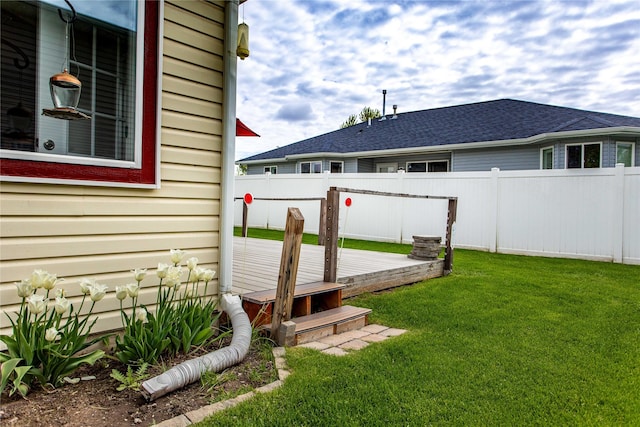 173 Empire Loop, Kalispell, MT 59901 - view of yard featuring a deck