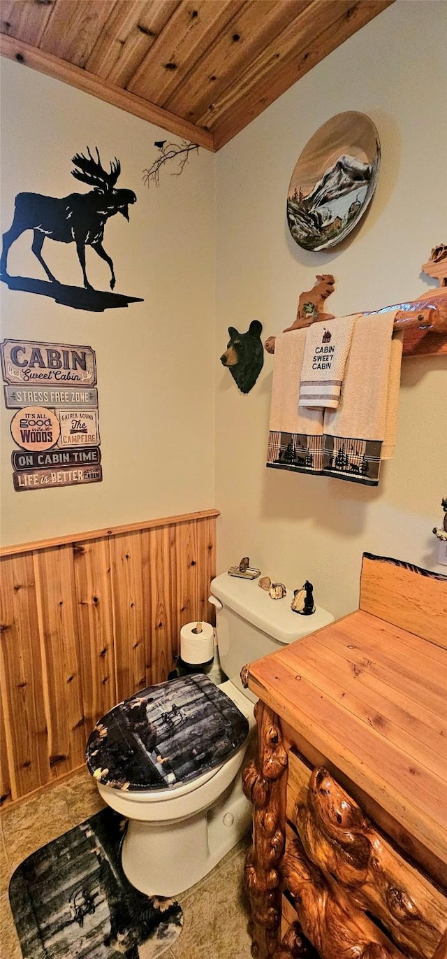 194 Whitetail Dr, Haugan, MT 59842 - bathroom featuring wood ceiling and toilet