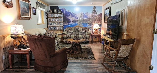 194 Whitetail Dr, Haugan, MT 59842 - living area featuring wood finished floors, crown molding, and wainscoting