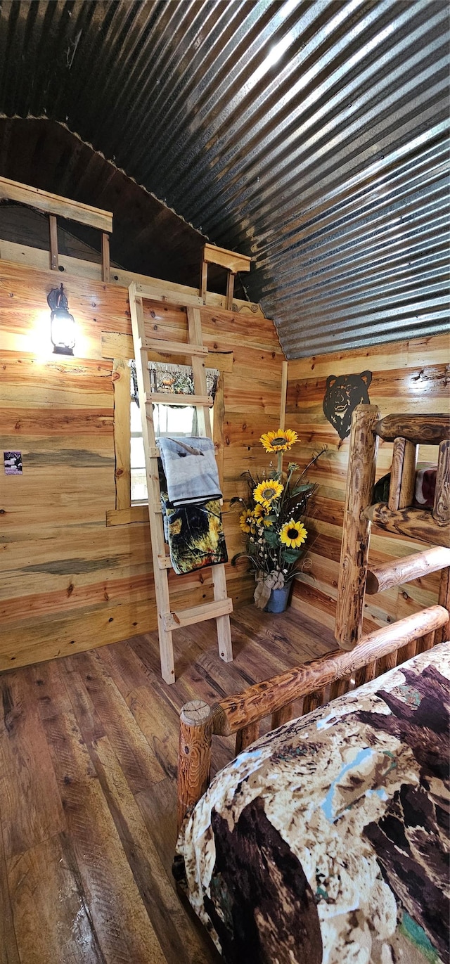 194 Whitetail Dr, Haugan, MT 59842 - bedroom featuring wood walls, hardwood / wood-style floors, and wooden ceiling