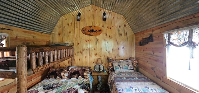 194 Whitetail Dr, Haugan, MT 59842 - bedroom featuring lofted ceiling, wooden walls, and wood ceiling