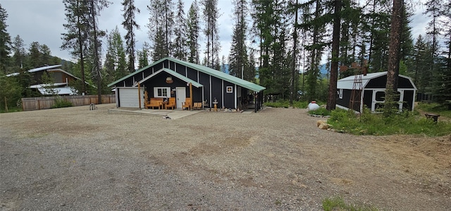 194 Whitetail Dr, Haugan, MT 59842 - view of front of property featuring an outdoor structure and driveway