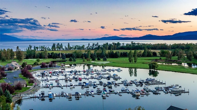 237 Harbor Dr, Bigfork, MT 59911 - aerial view of a water and mountain view and numerous boat docks