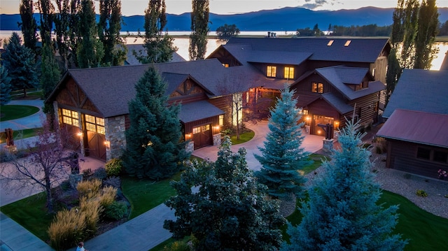 237 Harbor Dr, Bigfork, MT 59911 - drone / aerial view of a mountain backdrop