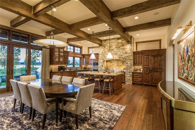 237 Harbor Dr, Bigfork, MT 59911 - dining area with beam ceiling, dark wood-type flooring, and coffered ceiling
