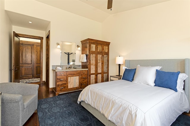 237 Harbor Dr, Bigfork, MT 59911 - bedroom with dark wood-style flooring, vaulted ceiling, and a ceiling fan