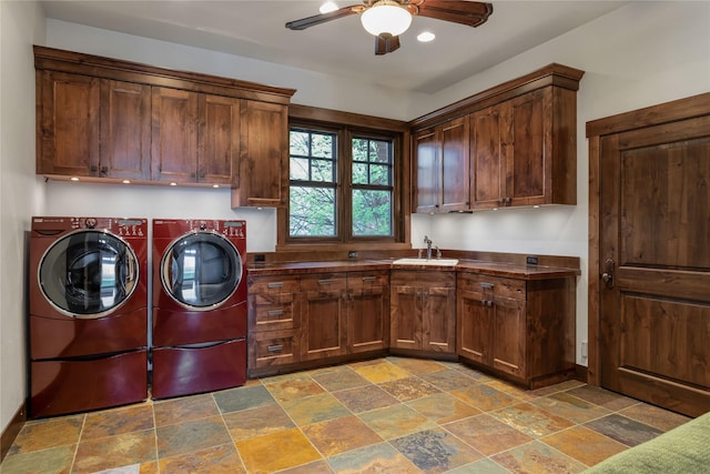 237 Harbor Dr, Bigfork, MT 59911 - washroom with cabinet space, washing machine and clothes dryer, stone finish flooring, ceiling fan, and recessed lighting
