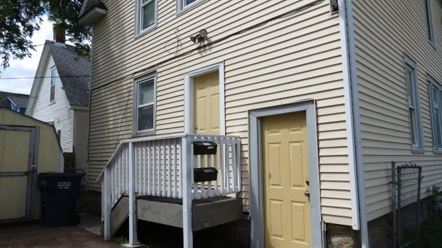 726 4th Ave S, Great Falls, MT 59405 - back of property featuring a wooden deck