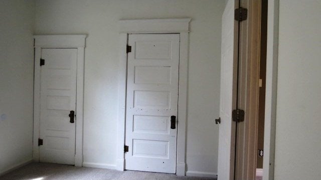 726 4th Ave S, Great Falls, MT 59405 - unfurnished bedroom with baseboards and carpet floors
