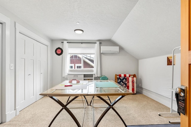 11501 Sleeman Creek Rd, Lolo, MT 59847 - office featuring a wall mounted air conditioner, carpet floors, lofted ceiling, and a textured ceiling