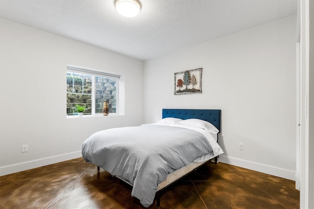 11501 Sleeman Creek Rd, Lolo, MT 59847 - bedroom featuring concrete floors