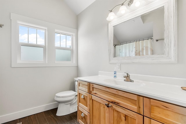 11501 Sleeman Creek Rd, Lolo, MT 59847 - bathroom featuring vanity, lofted ceiling, wood finished floors, and a shower with shower curtain