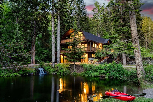 151 Handkerchief Creek Dr, Kalispell, MT 59901 - water view featuring a heavily wooded area