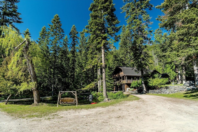 151 Handkerchief Creek Dr, Kalispell, MT 59901 - view of dirt / gravel road with a wooded view