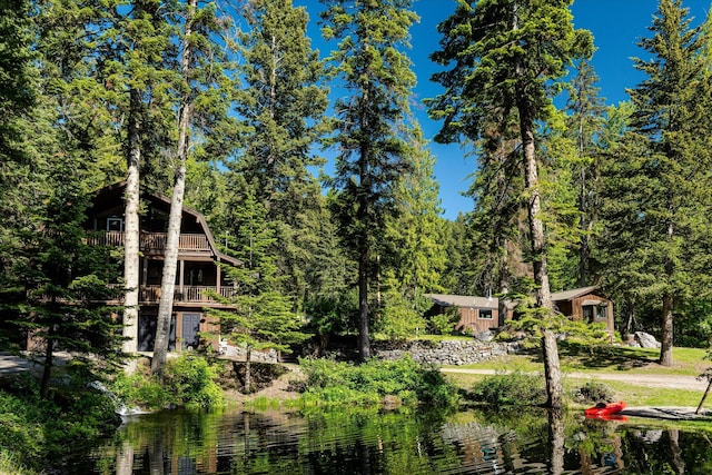 151 Handkerchief Creek Dr, Kalispell, MT 59901 - view of home's community featuring a water view and a view of trees