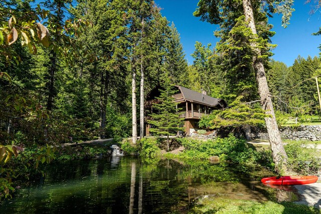 151 Handkerchief Creek Dr, Kalispell, MT 59901 - view of yard featuring a forest view