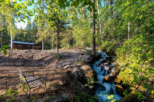 151 Handkerchief Creek Dr, Kalispell, MT 59901 - view of yard featuring a forest view