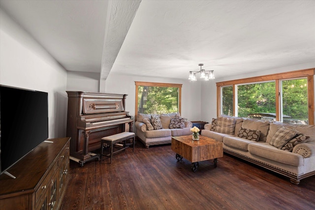 151 Handkerchief Creek Dr, Kalispell, MT 59901 - living room with dark wood-type flooring, plenty of natural light, and a chandelier
