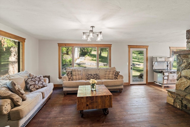 151 Handkerchief Creek Dr, Kalispell, MT 59901 - living area with a chandelier and dark wood-type flooring