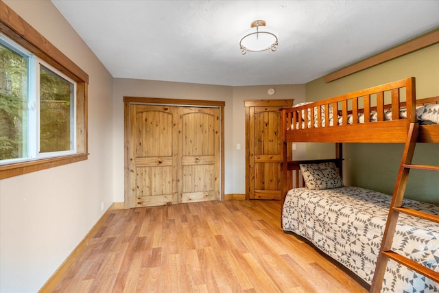 151 Handkerchief Creek Dr, Kalispell, MT 59901 - bedroom with wood finished floors and baseboards