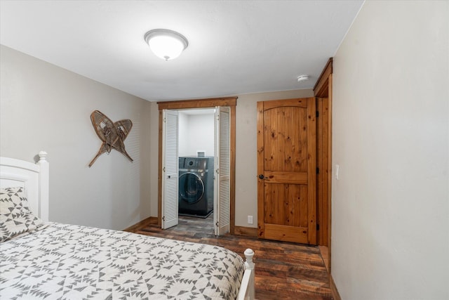 151 Handkerchief Creek Dr, Kalispell, MT 59901 - bedroom with washer / clothes dryer, dark wood finished floors, and a closet