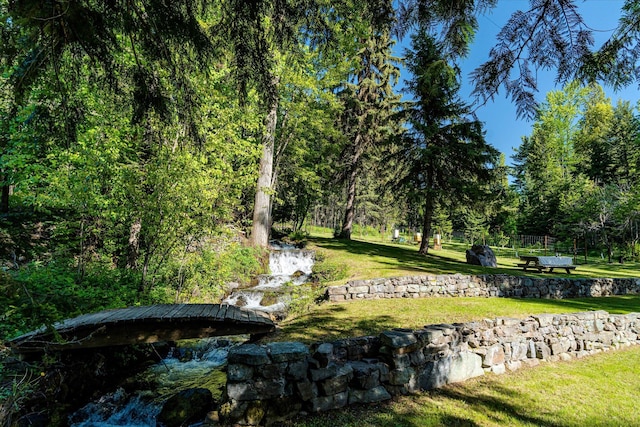 151 Handkerchief Creek Dr, Kalispell, MT 59901 - surrounding community featuring a yard