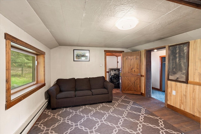 151 Handkerchief Creek Dr, Kalispell, MT 59901 - living area featuring washer / clothes dryer, baseboard heating, dark wood-type flooring, and lofted ceiling