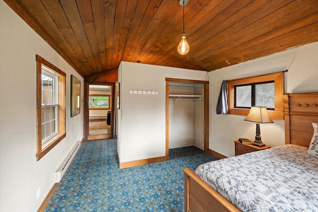 151 Handkerchief Creek Dr, Kalispell, MT 59901 - bedroom featuring a baseboard radiator, lofted ceiling, dark colored carpet, wood ceiling, and a closet