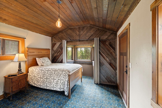 151 Handkerchief Creek Dr, Kalispell, MT 59901 - bedroom with wood walls, lofted ceiling, and wood ceiling