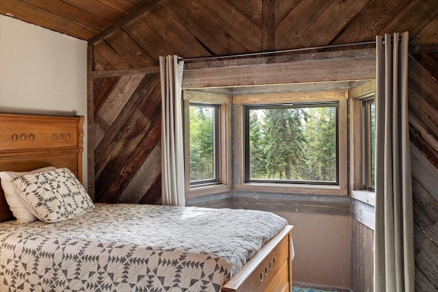 151 Handkerchief Creek Dr, Kalispell, MT 59901 - bedroom featuring wood ceiling and wood walls