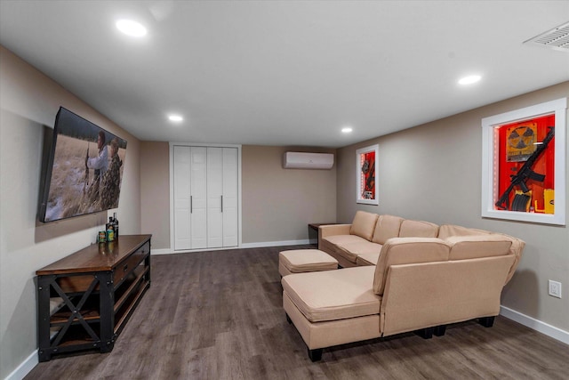 151 Handkerchief Creek Dr, Kalispell, MT 59901 - living area with a wall mounted air conditioner, wood finished floors, and recessed lighting