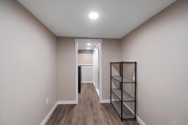 151 Handkerchief Creek Dr, Kalispell, MT 59901 - unfurnished room featuring wood finished floors and recessed lighting