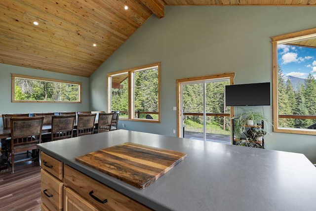 4111 Foothill Rd, Kalispell, MT 59901 - kitchen with recessed lighting, wood finished floors, a wood ceiling with exposed beams, high vaulted ceiling, and dark countertops