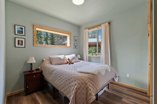 4111 Foothill Rd, Kalispell, MT 59901 - bedroom featuring dark wood-style flooring