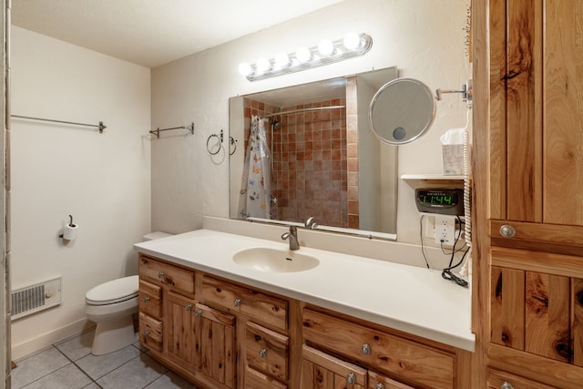 6040 Pearl Dr, Manhattan, MT 59741 - full bathroom featuring toilet, vanity, tile patterned floors, and a shower with shower curtain