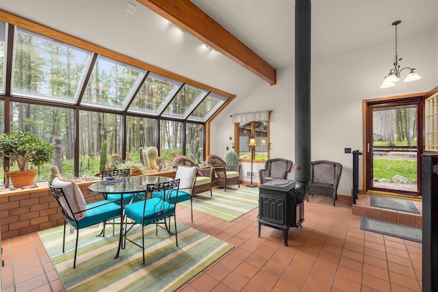 250 Sunday Ln, Kalispell, MT 59901 - sunroom featuring a wood stove and a chandelier
