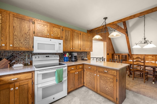 250 Sunday Ln, Kalispell, MT 59901 - kitchen with white appliances, light countertops, brown cabinets, a peninsula, and backsplash