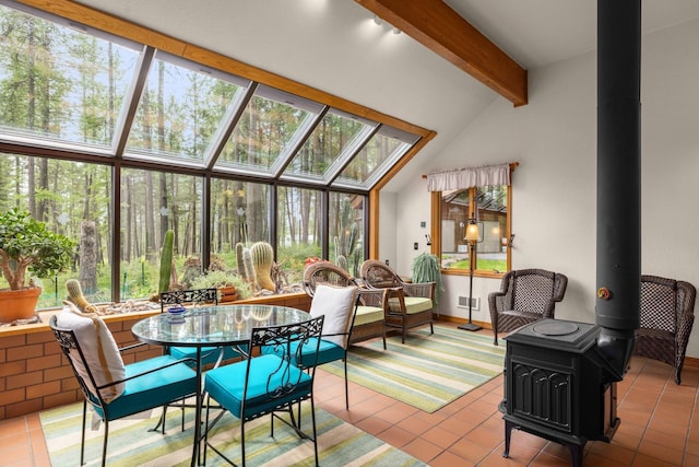 250 Sunday Ln, Kalispell, MT 59901 - sunroom / solarium featuring a wood stove