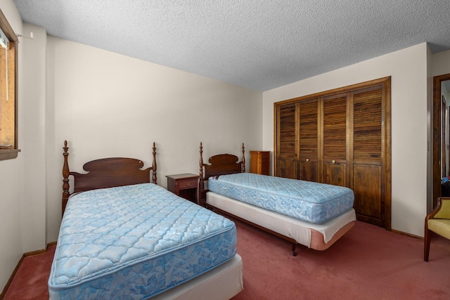 250 Sunday Ln, Kalispell, MT 59901 - carpeted bedroom with a closet and a textured ceiling