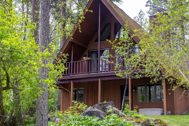 250 Sunday Ln, Kalispell, MT 59901 - rear view of property featuring a wooden deck