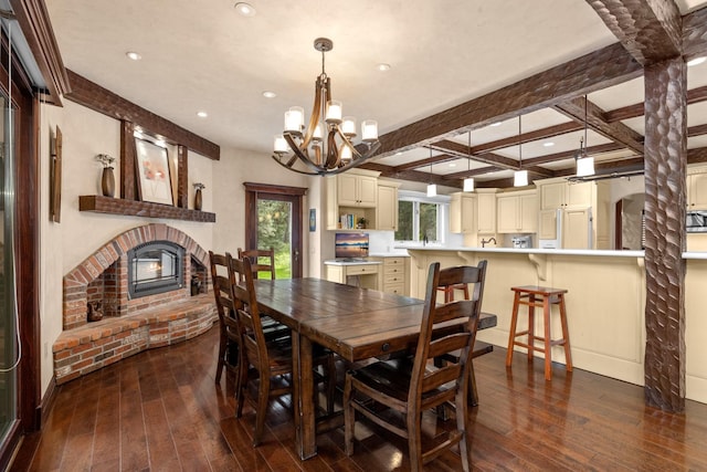 360 Plantation Dr, Kalispell, MT 59901 - dining room with dark wood finished floors, a fireplace, a chandelier, recessed lighting, and beam ceiling